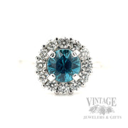 Blue Zircon 14k white gold and diamond halo ring close up