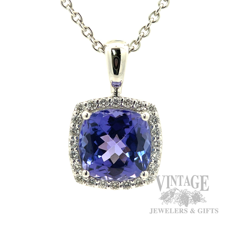 Cushion shaped tanzanite and diamond 14k white gold halo pendant Front