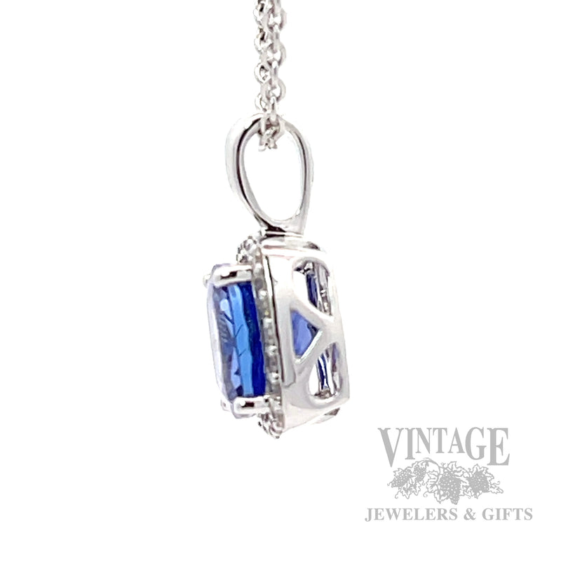 Cushion shaped tanzanite and diamond 14k white gold halo pendant side