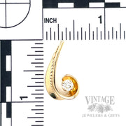 Scroll 14k gold and diamond .33 carat solitaire pendant scale