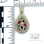 Ruby, emerald, sapphire and diamond pear shaped 14k gold pendant front