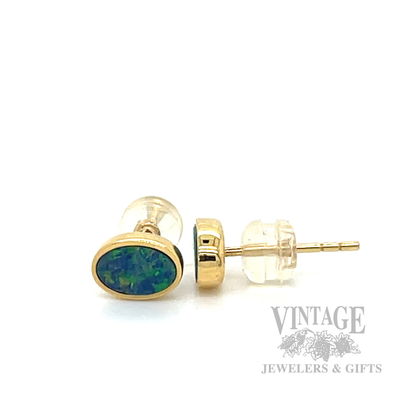 Oval opal 18k gold stud earrings side