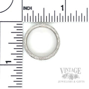 Pierced Floral 18k White Gold Eternity Ring Scale View