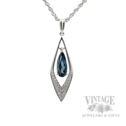 Dangling Blue Topaz Diamond Accented 14k White Gold Necklace Close Up View