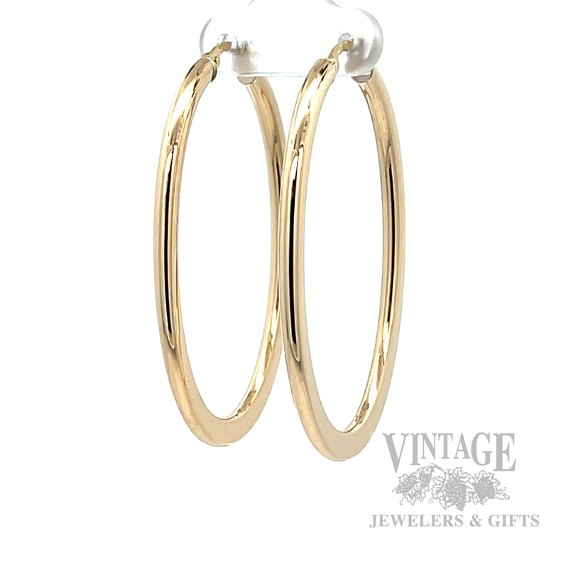 Oval Tube Hoops 18K Yellow Gold Earrings Perspective View