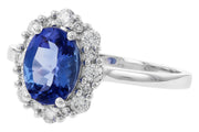 14kw gold tanzanite and diamond halo ring, angled view