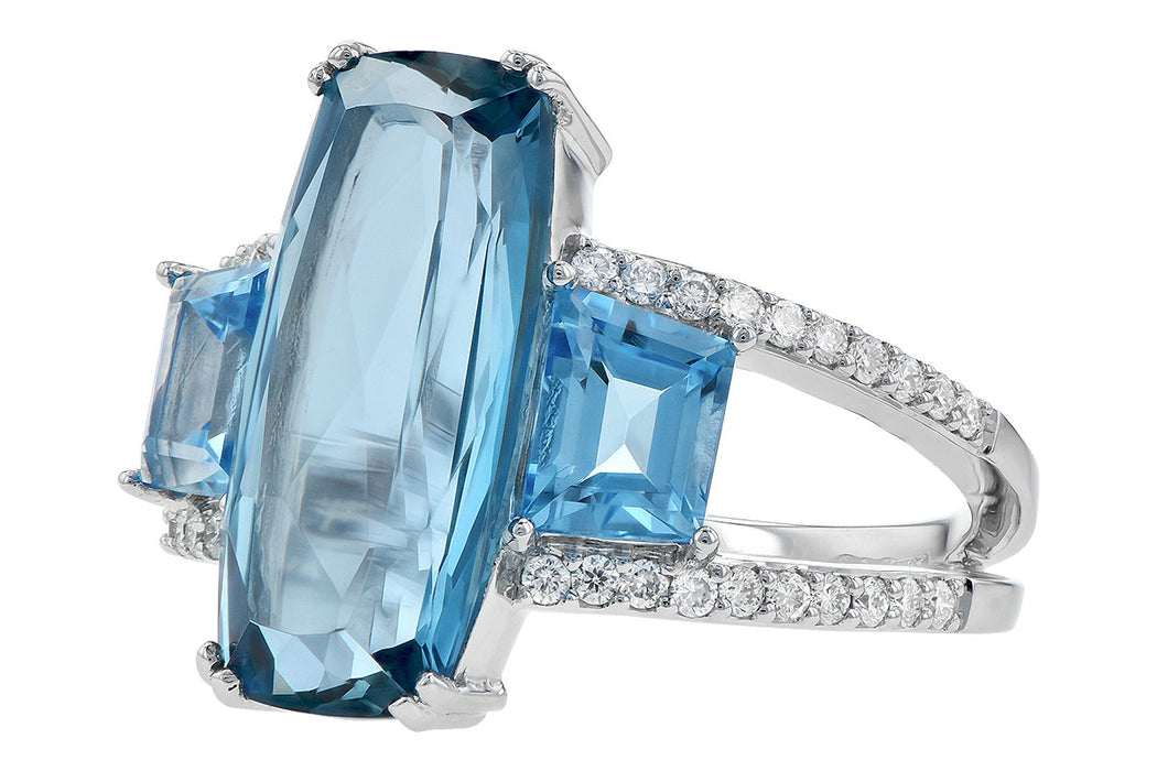 14kw gold three stone blue topaz and diamond ring, angled view