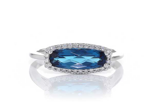 14kw gold East-West London blue topaz and diamond halo ring