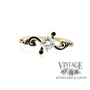14 karat yellow gold scroll motif .29 carat diamond solitaire ring
