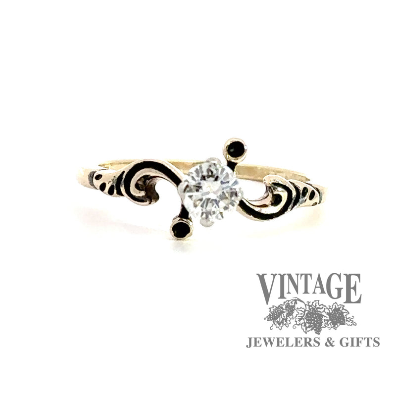14 karat yellow gold scroll motif .29 carat diamond solitaire ring