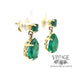 Natural emerald 18ky gold drop earrings angled