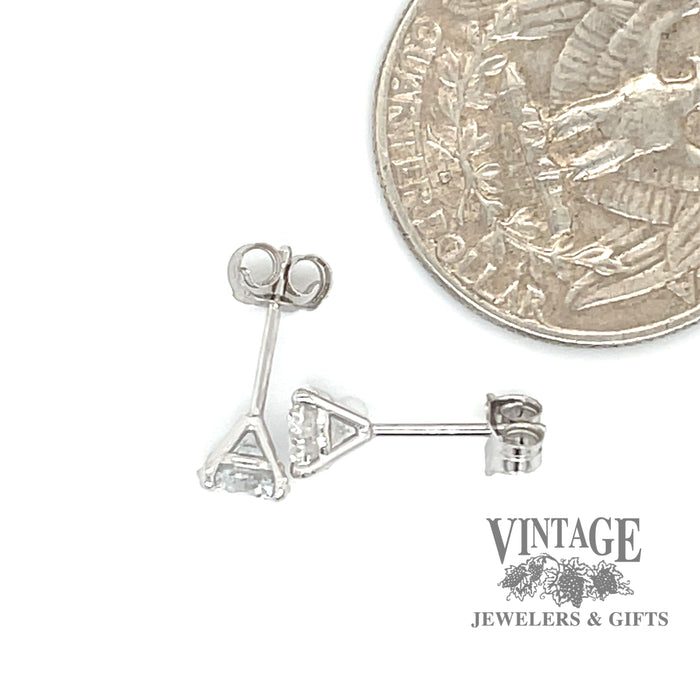 14 karat white gold 1.0ctw lab grown diamond martini stud earrings, shown with quarter for size reference