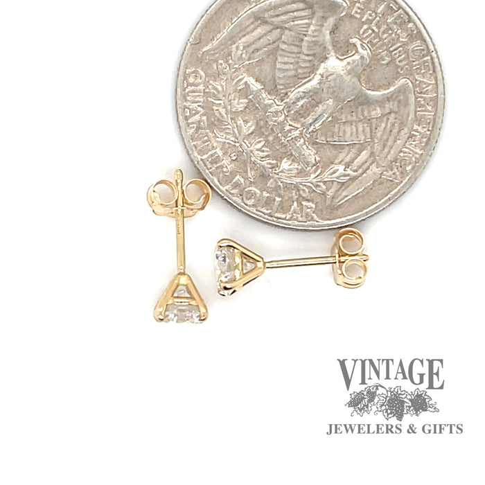 14 karat yellow gold 1.0ctw lab grown diamond martini stud earrings, shown with quarter for size reference