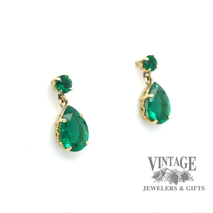 Natural emerald 18ky gold drop earrings angle
