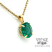 Heirloom quality natural emerald 18ky gold pendant angle