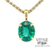 Heirloom quality natural emerald 18ky gold pendant hanging