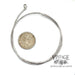 14 karat white gold 17" round spiral mesh choker necklace, shown with a quarter for size reference