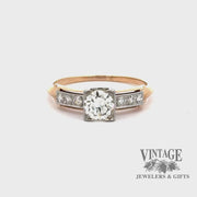 Revolving video of 14 karat/18 karat two tone .60 carat total weight diamond illusion head antique engagement ring