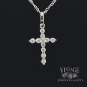 Diamond and 14kw gold “bubble” style cross necklace video