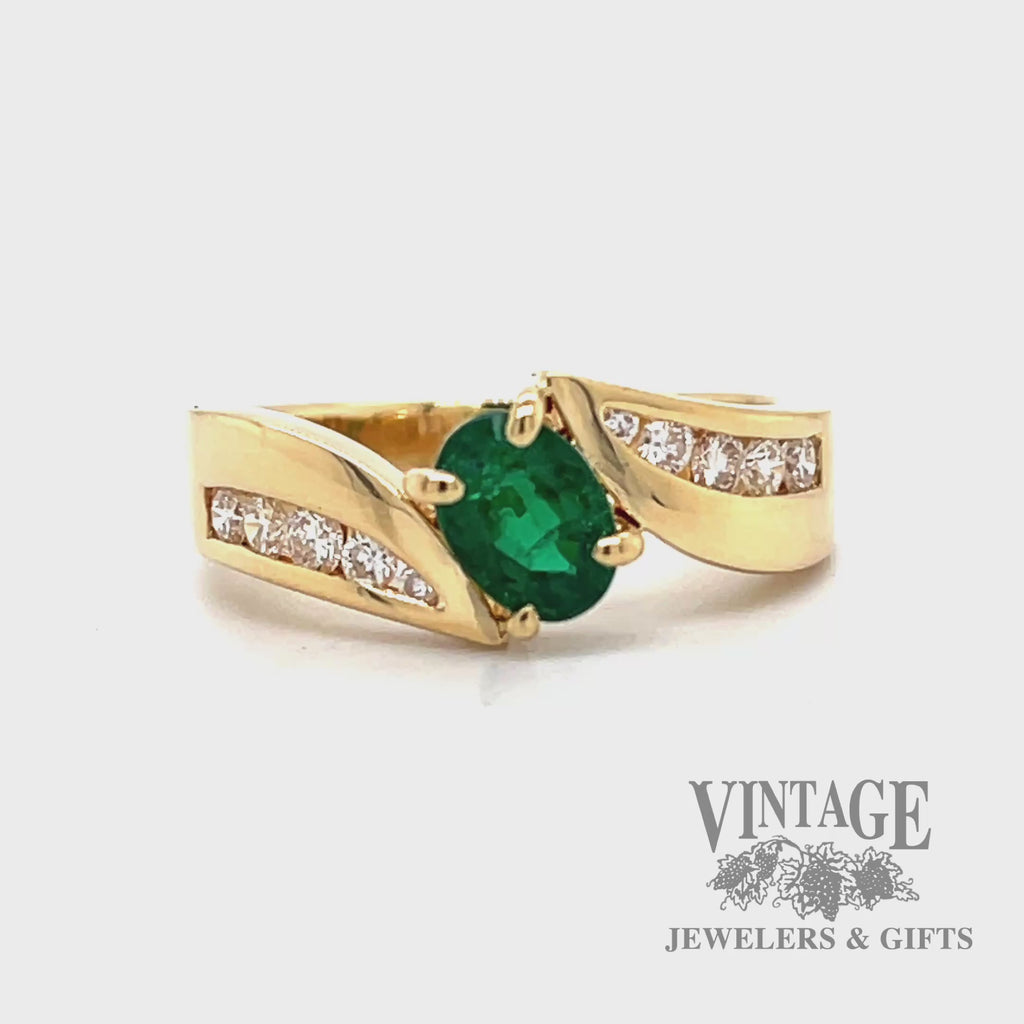 Emerald and diamond accents set in 18k yellow gold bypass ring video