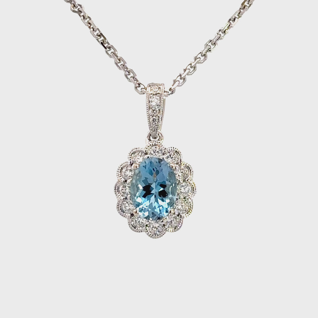 Aquamarine and diamond oval 18kw gold pendant video