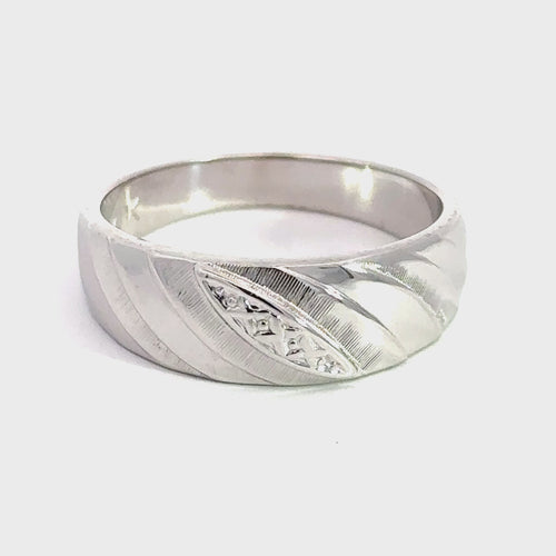 Revolving video of 14 karat white gold marquise shape Illusion setting band