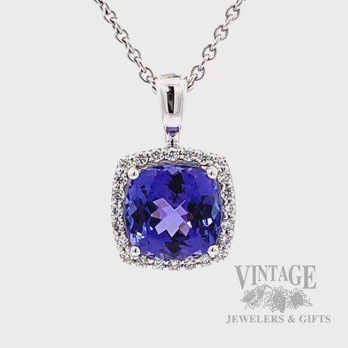 Cushion shaped tanzanite and diamond 14k white gold halo pendant rotating video