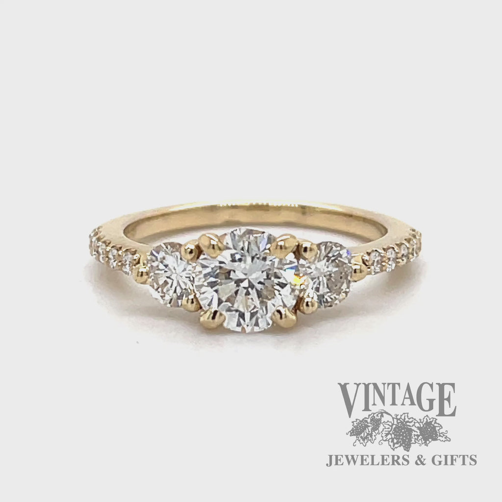 Three stone 14k gold natural diamond ring with accented diamond shank, 1.73 CTW. video