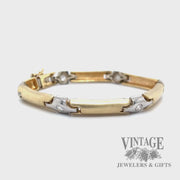 Contemporary 14k two tone gold and diamond link bracelet video