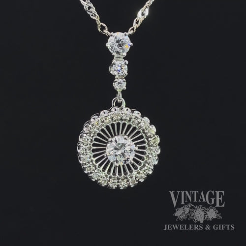 Revolving video of 18kw gold antique 1.12ctw diamond halo pendant