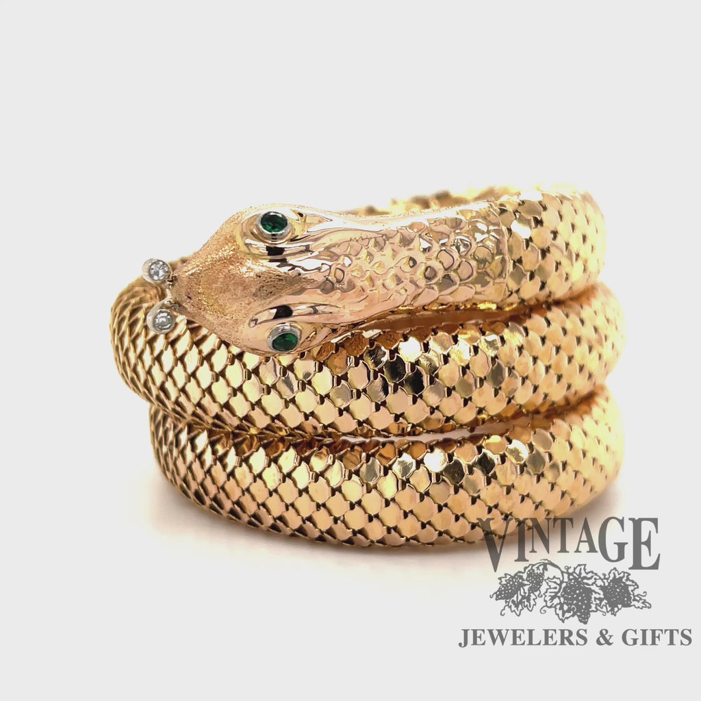 Revolving video of 18 karat yellow gold "coiled" Snake arm wrap bracelet