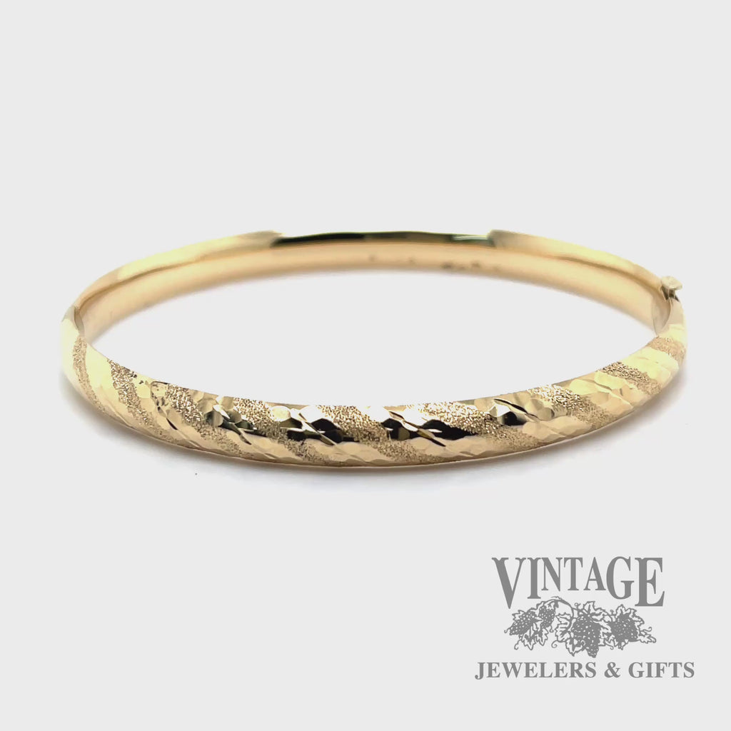 Twisted stripe 14k yellow gold bangle bracelet video