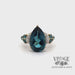 Revolving video of 10ky gold London blue pear shaped and diamond ring