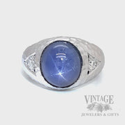 Natural Blue Star sapphire, diamond 14kw gold three stone hammered and satin finished ring video showing asterism