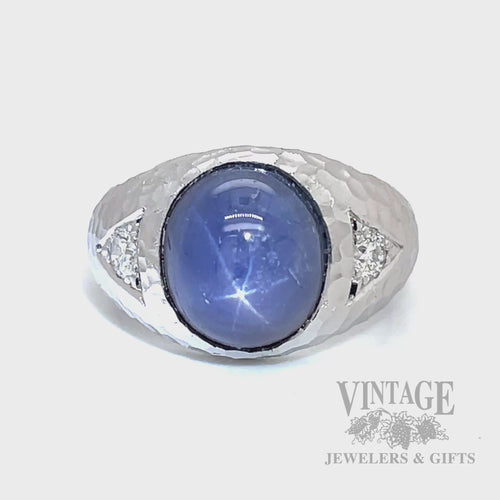 Natural Blue Star sapphire, diamond 14kw gold three stone hammered and satin finished ring video showing asterism
