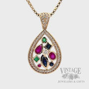 Ruby, emerald, sapphire and diamond pear shaped 14k gold pendant front