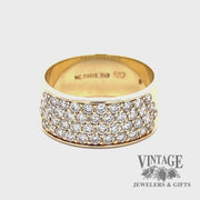 Revolving video of 18 karat yellow gold 1.3 ctw pave diamond flat band ring
