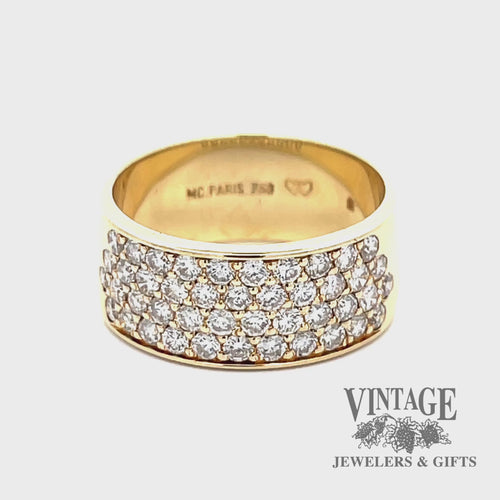 Revolving video of 18 karat yellow gold 1.3 ctw pave diamond flat band ring