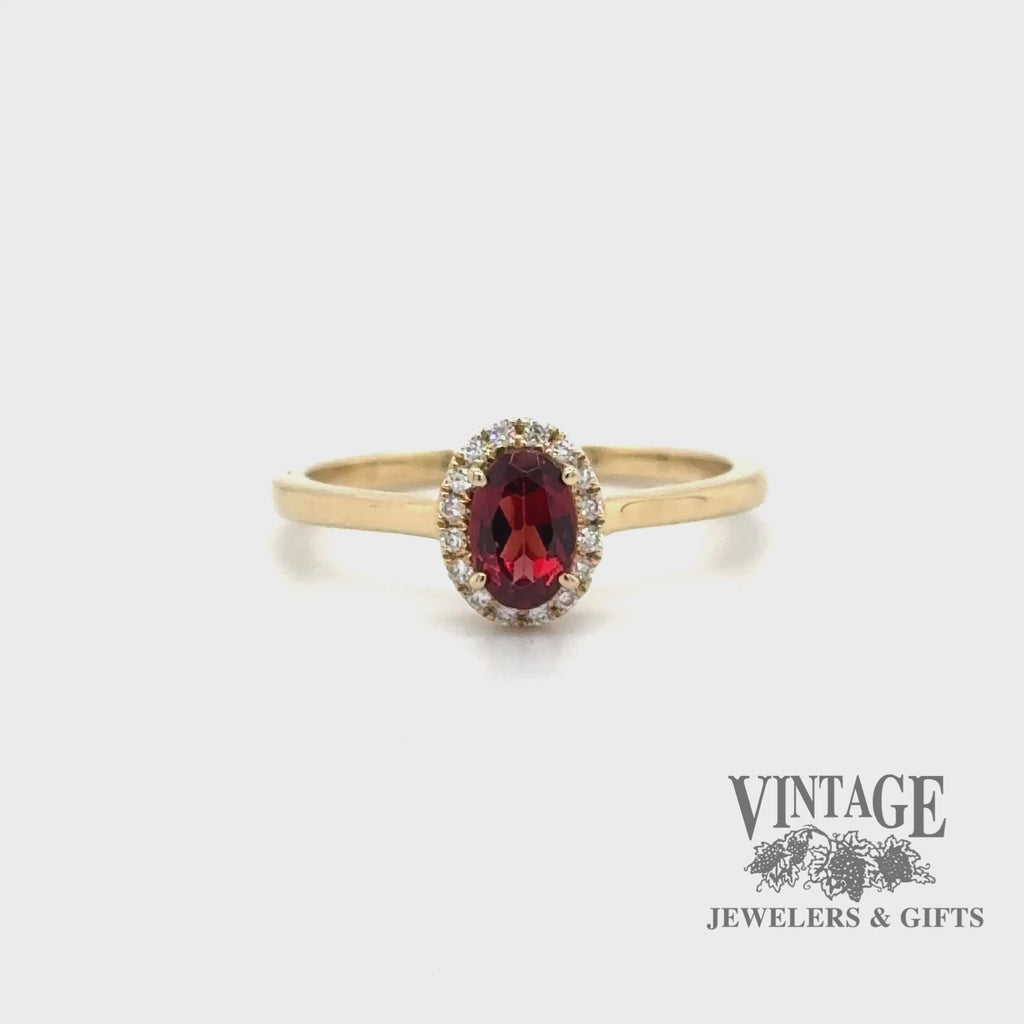 Oval garnet and diamond 14ky gold halo ring video