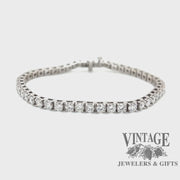 Revolving video of 14 karat white gold 7 ctw natural diamond tennis bracelet