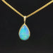 Ethiopian opal set in yellow gold teardrop pendant video