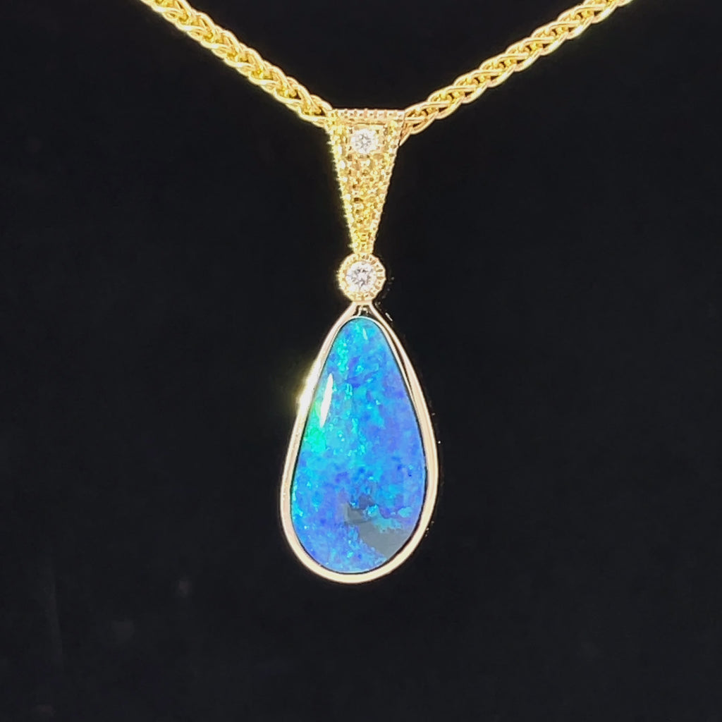 Black opal and diamond 14k gold pendant video
