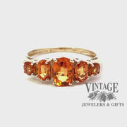 Revolving video of 10 karat yellow gold 5-stone mandarin garnet ring