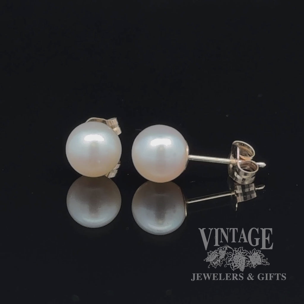 14 karat yellow gold 6.5 mm cultured white pearl pierced stud earrings, revolving video
