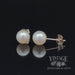 14 karat yellow gold 6.5 mm cultured white pearl pierced stud earrings, revolving video