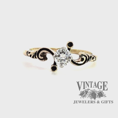 revolving video of 14 karat yellow gold scroll motif .29 carat diamond solitaire ring