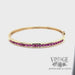 1.4 ctw ruby 14k yellow gold hinged bangle bracelet video