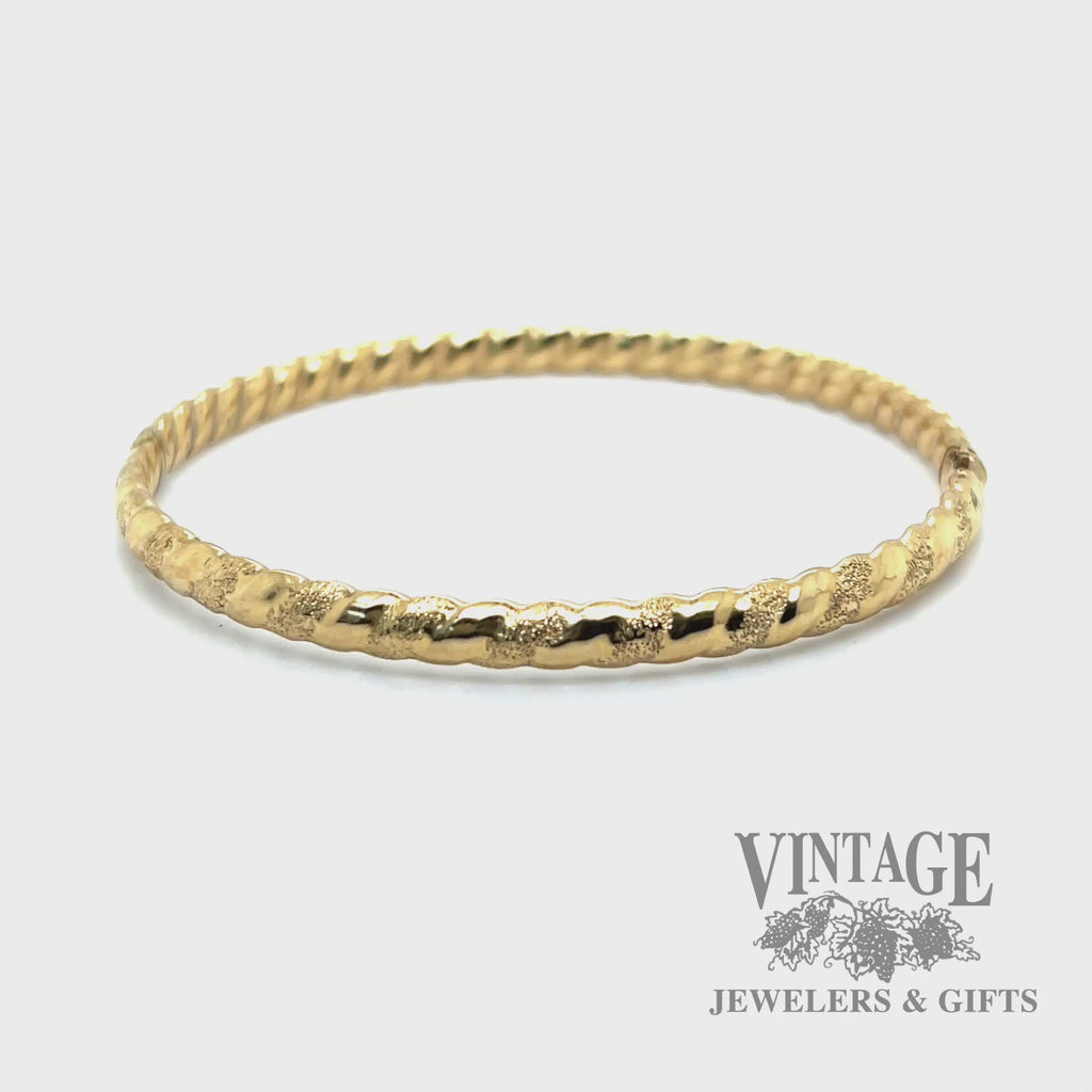 Twisted stripe 14k yellow gold bangle bracelet video