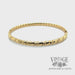 Twisted stripe 14k yellow gold bangle bracelet video