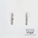 Video 14k white gold oval huggie diamond earring